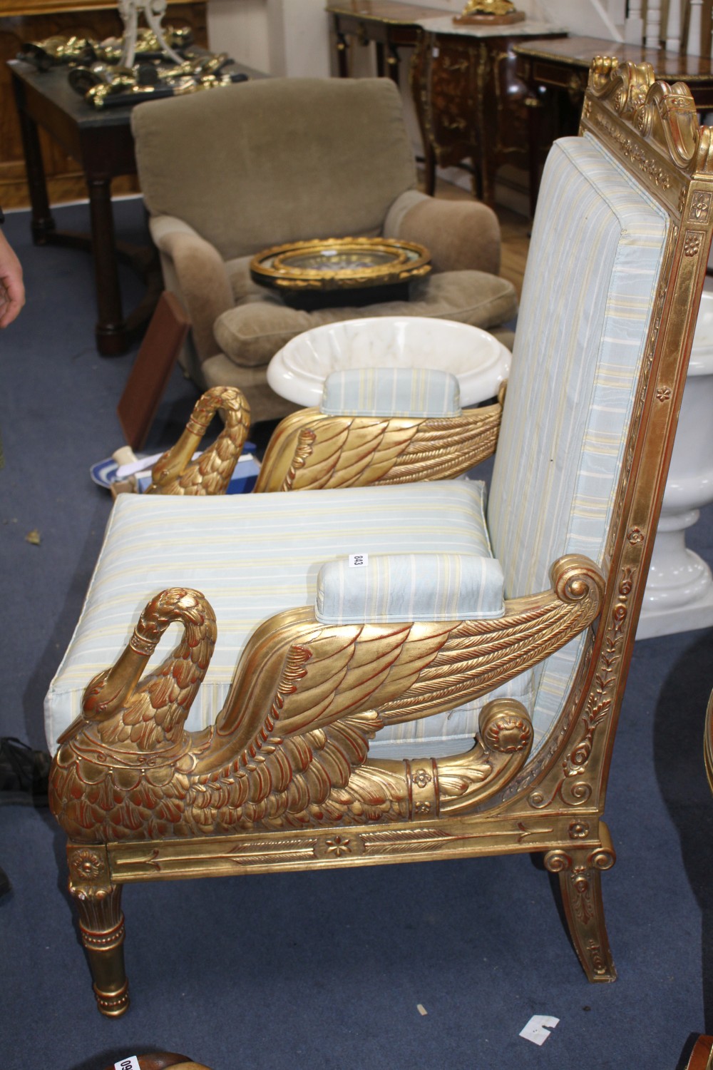 A French Empire carved giltwood armchair, W.76cm D.76cm H.116cm